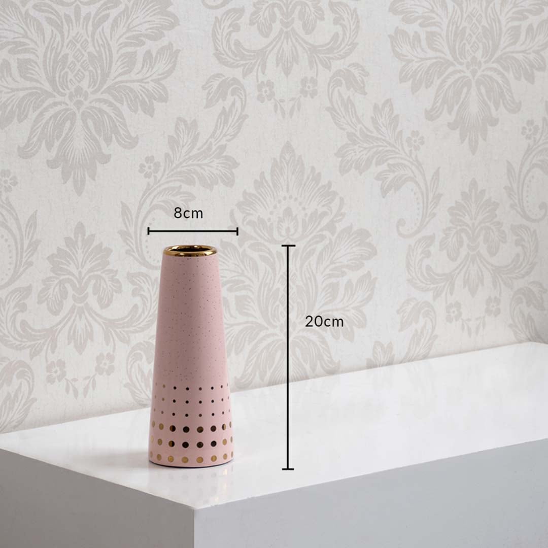 Pink ceramic vase with gold detailing shown with dimensions 20 cm height and 8 cm width providing accurate size reference for decor planning.