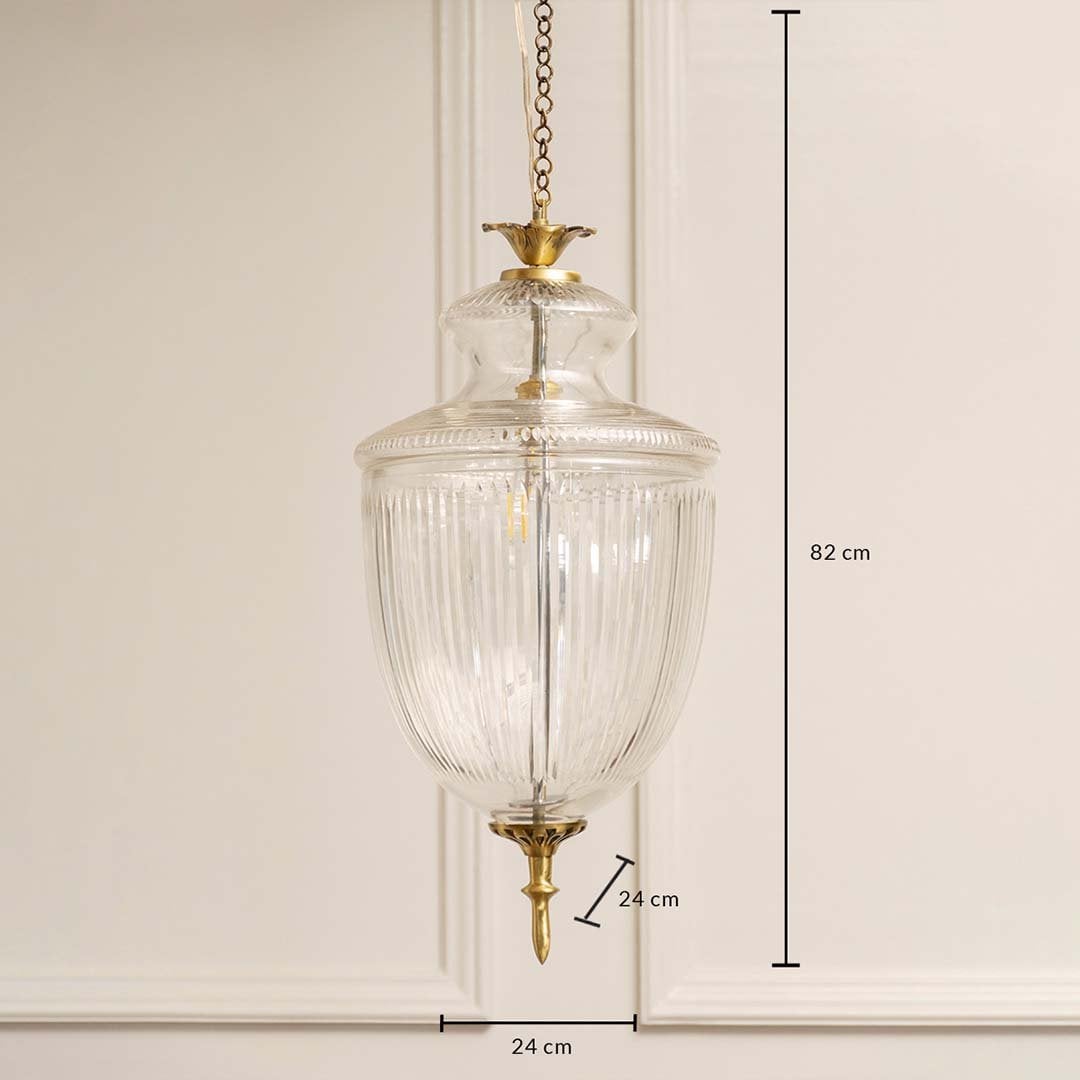 Dimension image of clear ribbed glass and antique brass pendant light showing 60 cm height and 20 cm width.