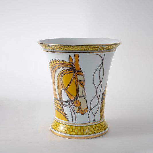 White and gold vase decorated with delicate floral artwork made for luxury artistic décor adding elegance style and handcrafted beauty to elevate any high-end interior setting.