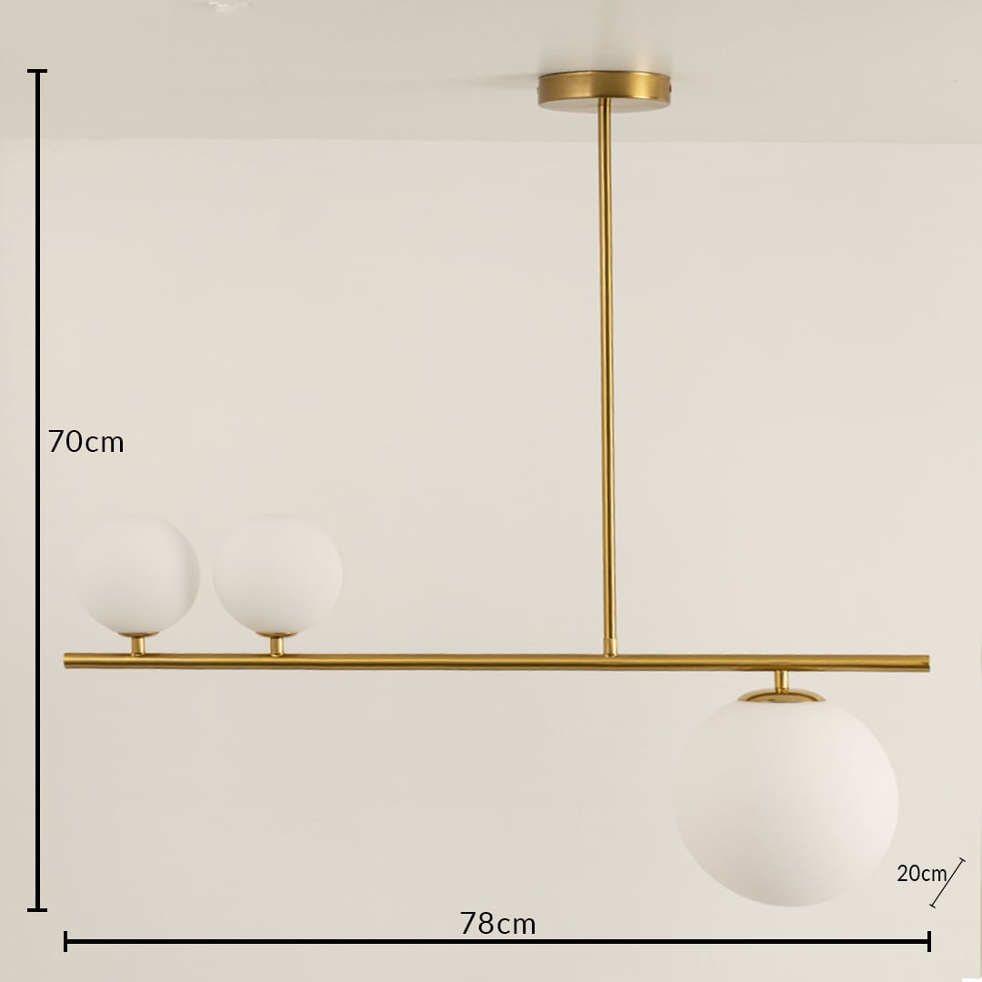 Gold metal chandelier with frosted glass globe shades measuring 70 cm height and 78 cm width for modern interiors.
