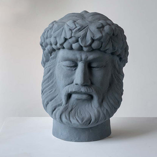 Grey ceramic decorative face sculpture with classical portrait design for elegant tabletop styling and home decor.