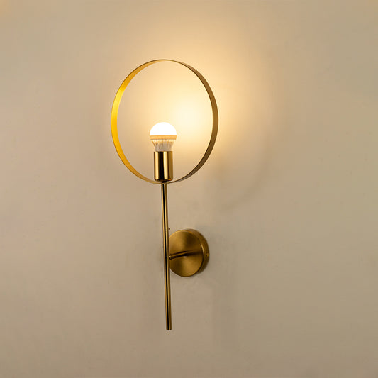 Modern gold ring wall light with warm ambient glow for stylish bedroom and premium decor styling spaces.