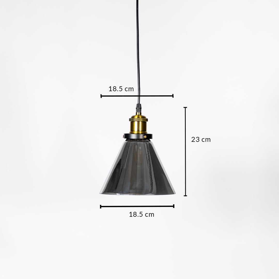 Pendant light with smokey glass shade brass fitting and black cord shown with 23cm height and 18.5cm width.