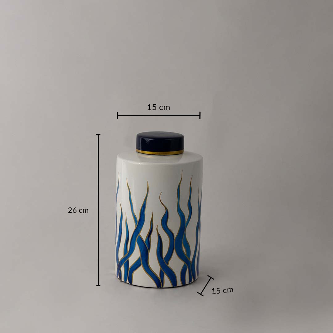 White and blue ceramic jar with gold rim shown with 26 cm height and 15 cm width for size and proportion reference.