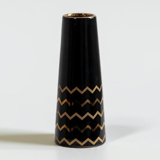 Black ceramic decorative vase with gold zigzag detailing and tapered silhouette for elegant modern home decor styling.