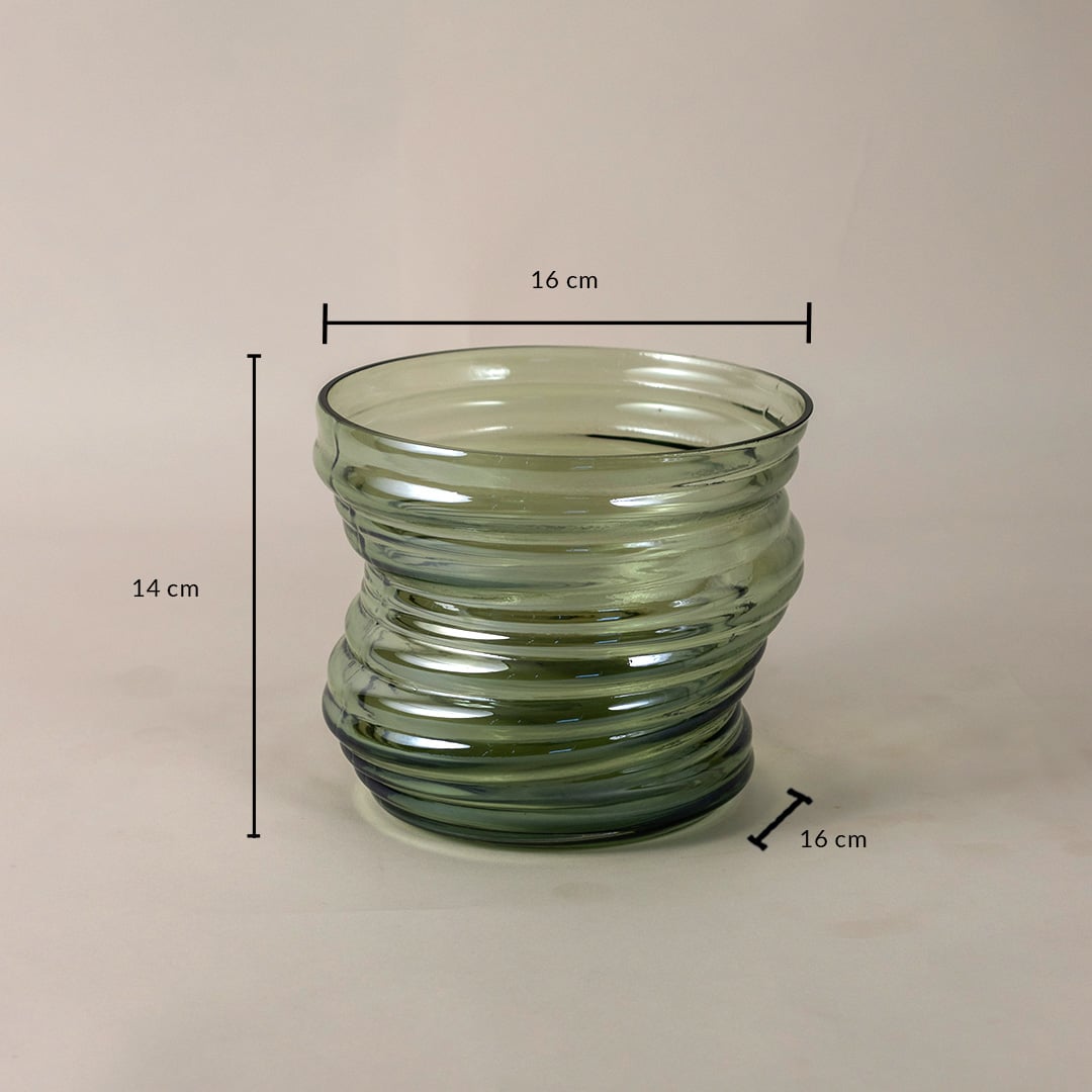Green ribbed glass vase with a unique wavy structure measuring 14 cm tall and 16 cm wide displayed with dimensions.