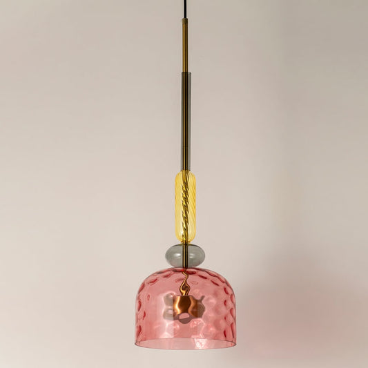 Pink hammered glass pendant light with gold accents crafted for elegant contemporary living spaces.