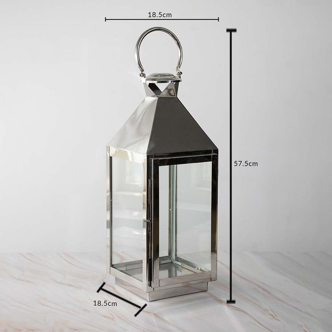 Large silver lantern dimensions 57.5cm height and 18.5cm width with stainless steel body and glass panels.