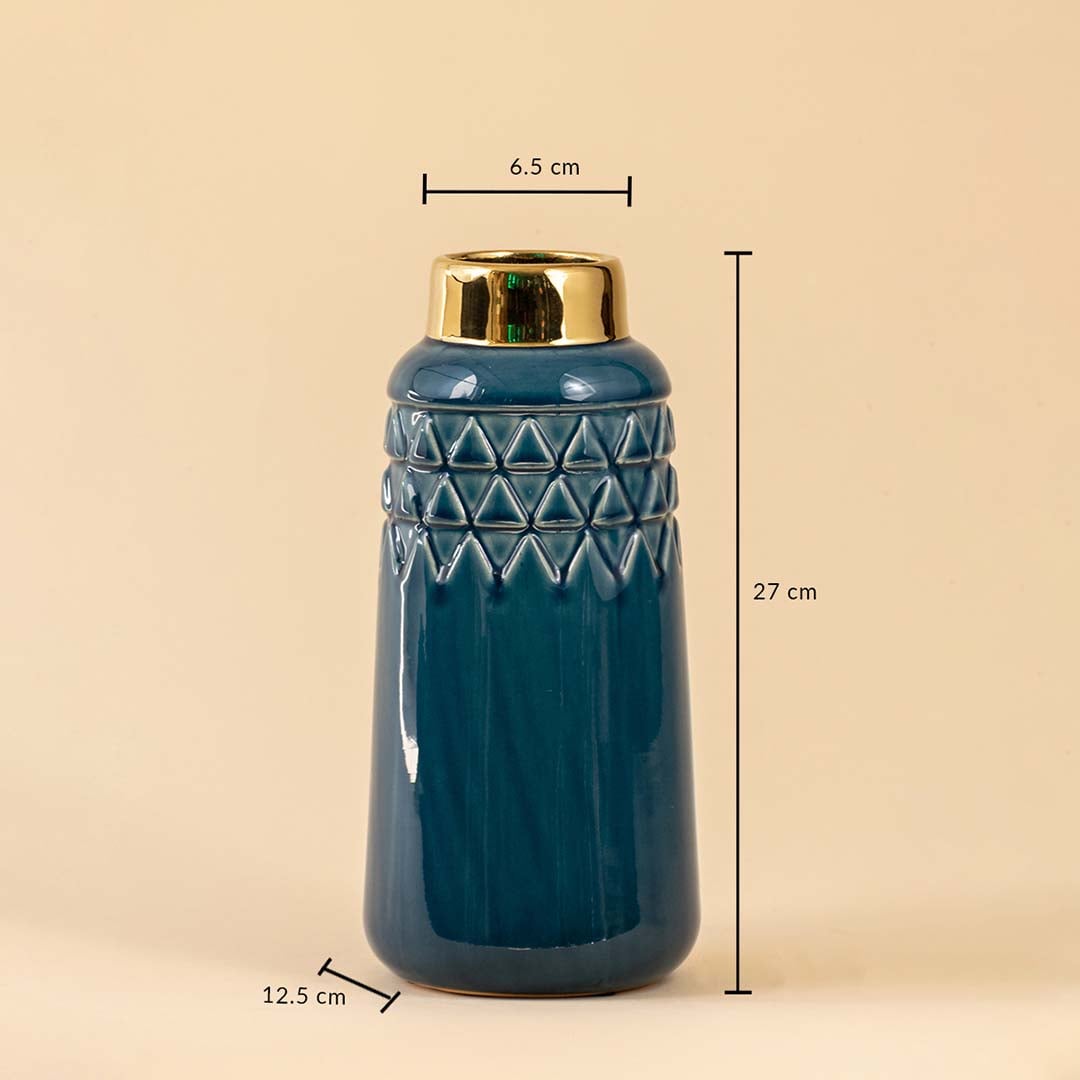 A tall blue ceramic vase on a beige background with measurements clearly marked as 27 cm height 12 cm width and 6 cm top opening diameter providing exact sizing details.