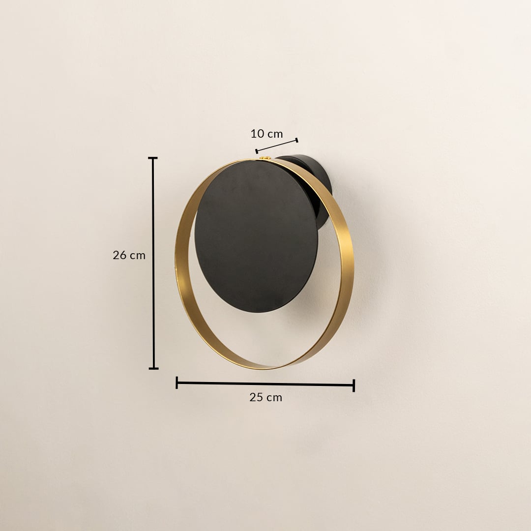 Modern black and brass wall light measuring 30 cm height and 25 cm width for stylish interiors.