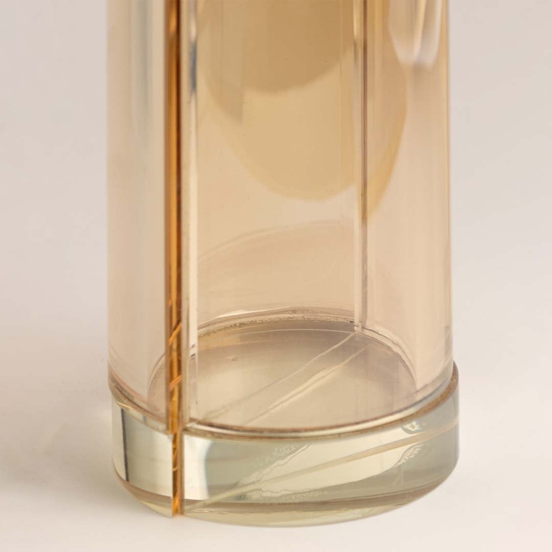 Macro view of amber vase cut and polish showing amber vase material and craftsmanship detail.