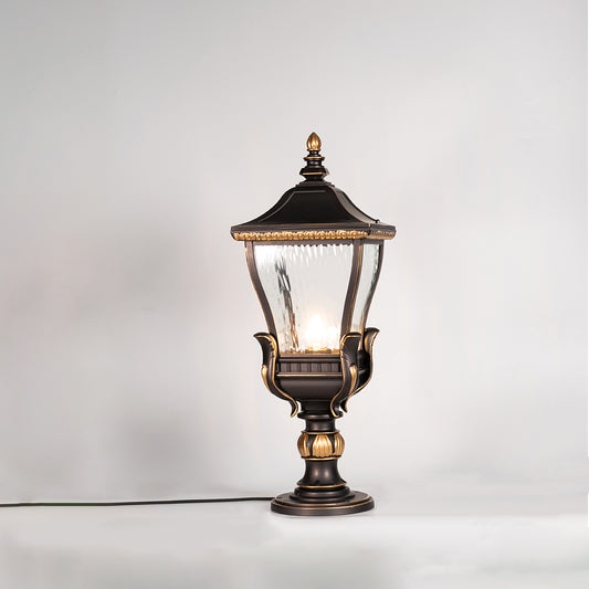 Vintage black outdoor gate light with warm glowing bulb for elegant exterior decor styling use.