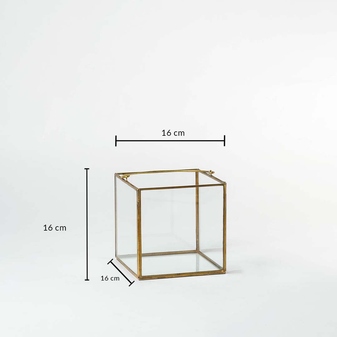 Gold metal cube decor stand showing dimensions 16 cm width 16 cm depth and 16 cm height for tabletop styling.