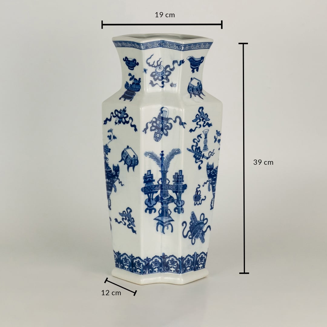 Blue and white ceramic decorative vase with floral artwork showing product dimensions for elegant home decor displays.