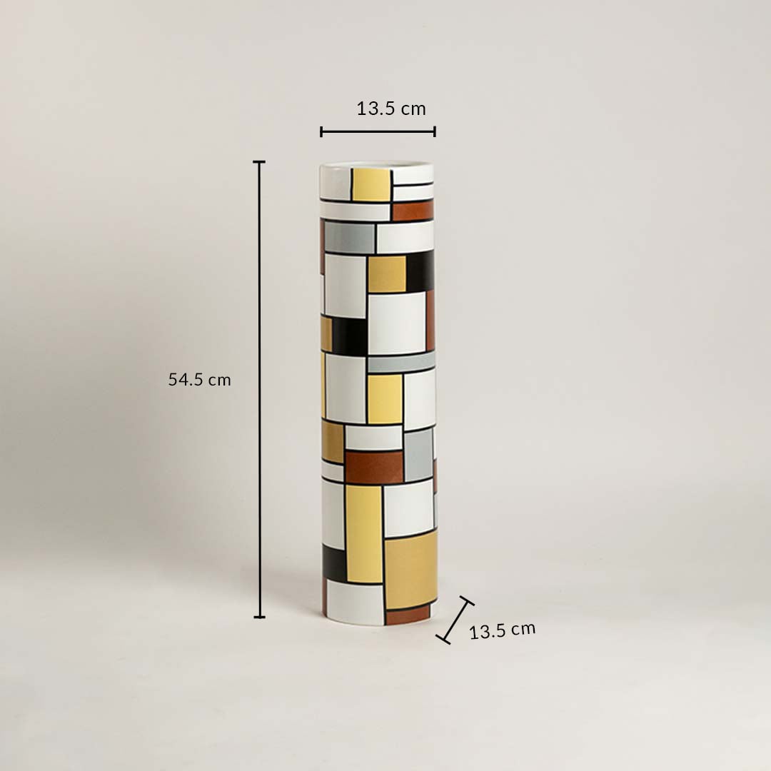 Tall geometric ceramic vase measured at 54 cm height and 13 cm width shown on a white background highlighting its modern multicolor block design.