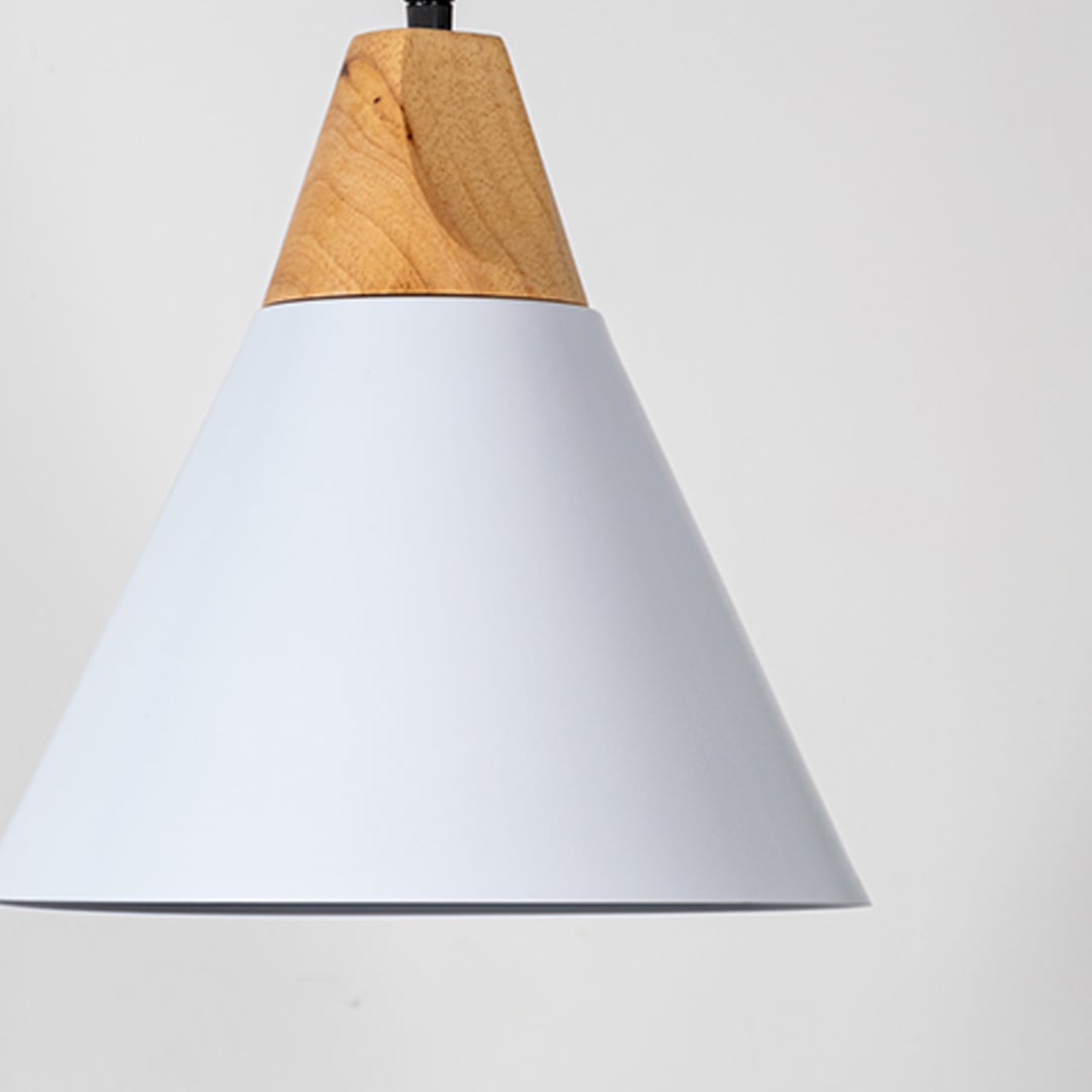 White metal pendant light with natural wood detailing showcasing wide cone shape and modern Scandinavian style.
