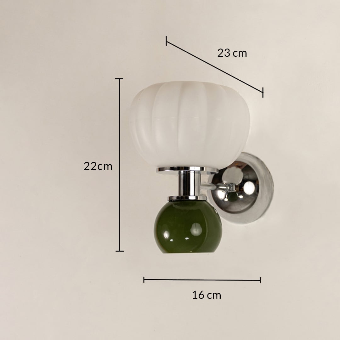 Wall light with white glass shade and green glass accent showing 22 cm height 22 cm width and 16 cm projection.