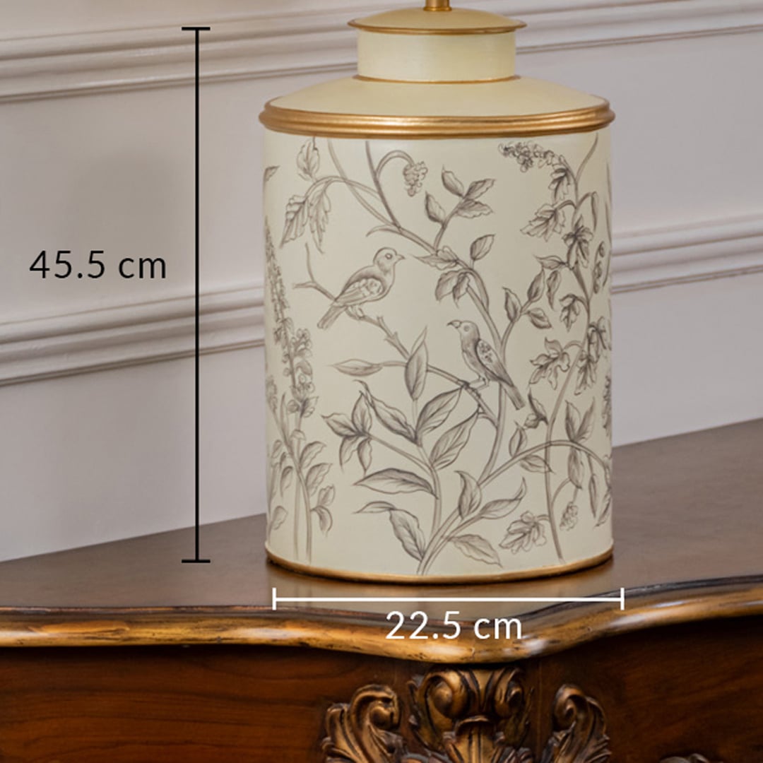 Table lamp featuring a leaf pattern ceramic base displayed with 45.5 cm height and 23 cm width for accurate dimensions.