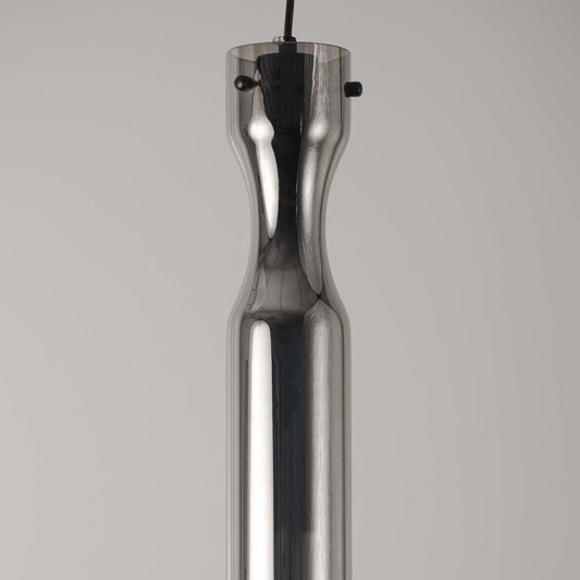 Sleek metallic pendant light with chrome finish on neutral background modern minimal lighting ideal for kitchen and dining decor.