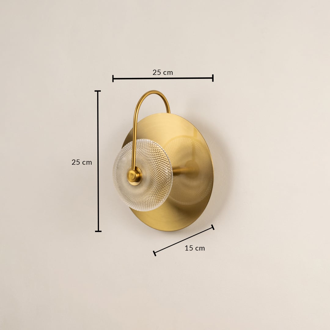 Gold metal wall light with 25 cm height 23 cm width and 15 cm depth for luxury modern home decor spaces.