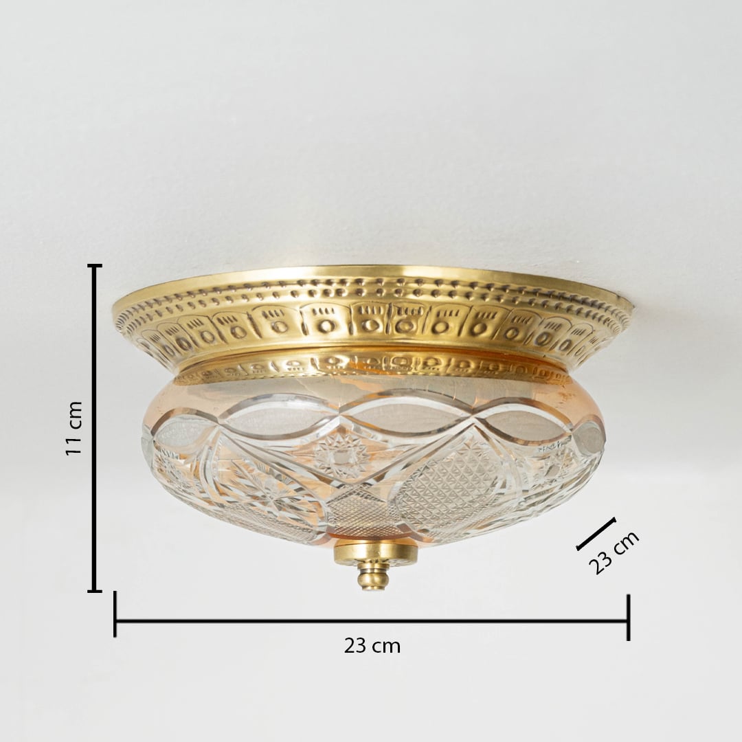 Brass and cut glass ceiling light with 23 cm diameter and 11 cm height shown with scale for accurate measurement.
