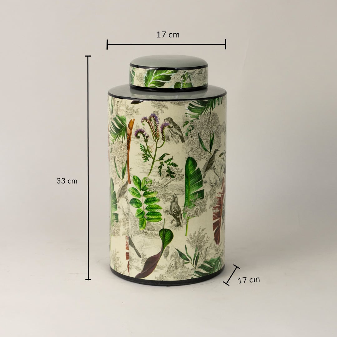 Tropical leaf jar measuring 33 cm tall and 17 cm wide featuring tropical greenery design and cylindrical shape.