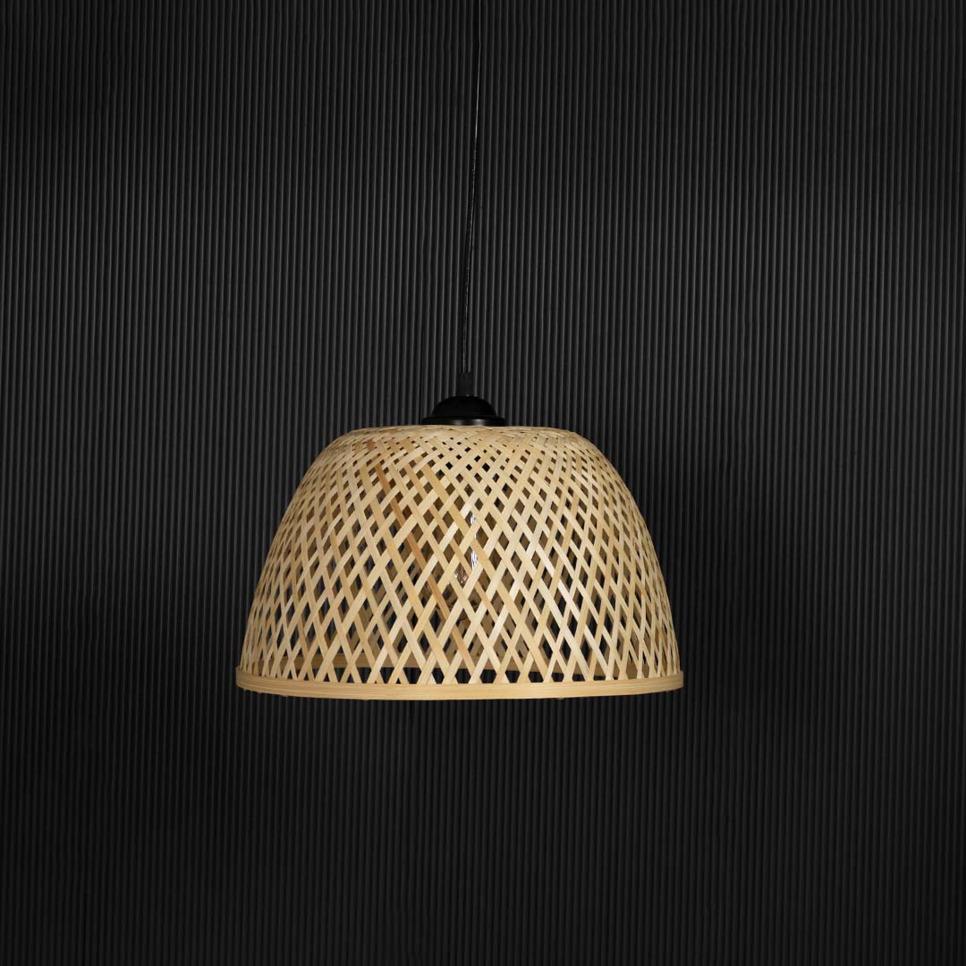 Bamboo woven pendant light bulb off on white background with dome wicker design for natural bohemian interiors.