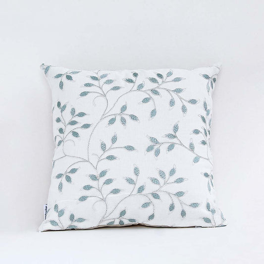 White cotton cushion cover with grey botanical embroidery giving a calm natural décor feel with a breathable soft and skin friendly fabric ideal for modern and elegant interiors.