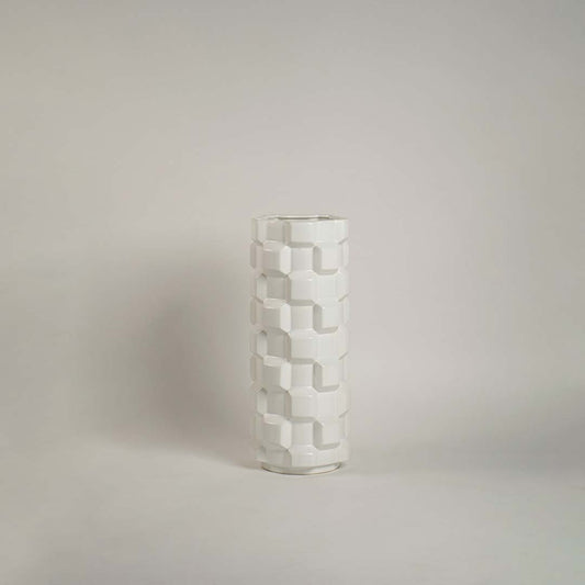 Glossy ceramic vase with cube textured geometric design displayed on plain white background for product view.