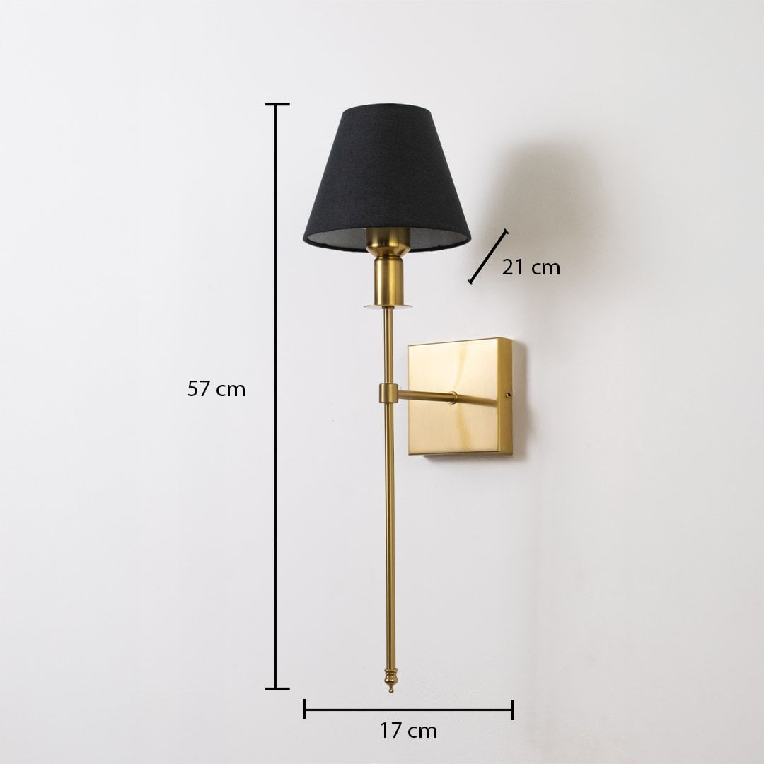 Gold wall sconce with black shade shown with 57 cm height 17 cm width and 21 cm depth for accurate placement.
