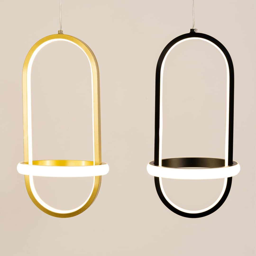 Set of gold and white metal oval hanging lights displayed together for coordinated modern home wall decor styling.