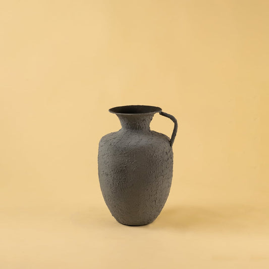 Grey metal jug vase decor on a clean white background highlighting its textured matte finish for versatile home styling.