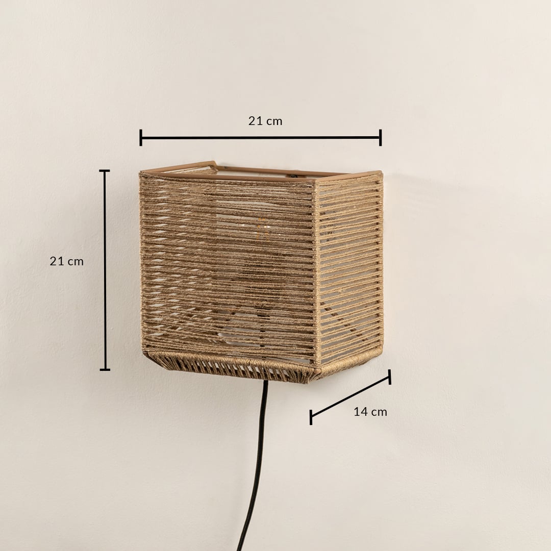 Handwoven jute wall light measuring 21 x 21 x 14 cm combines rustic charm with modern design perfect for ambient lighting.