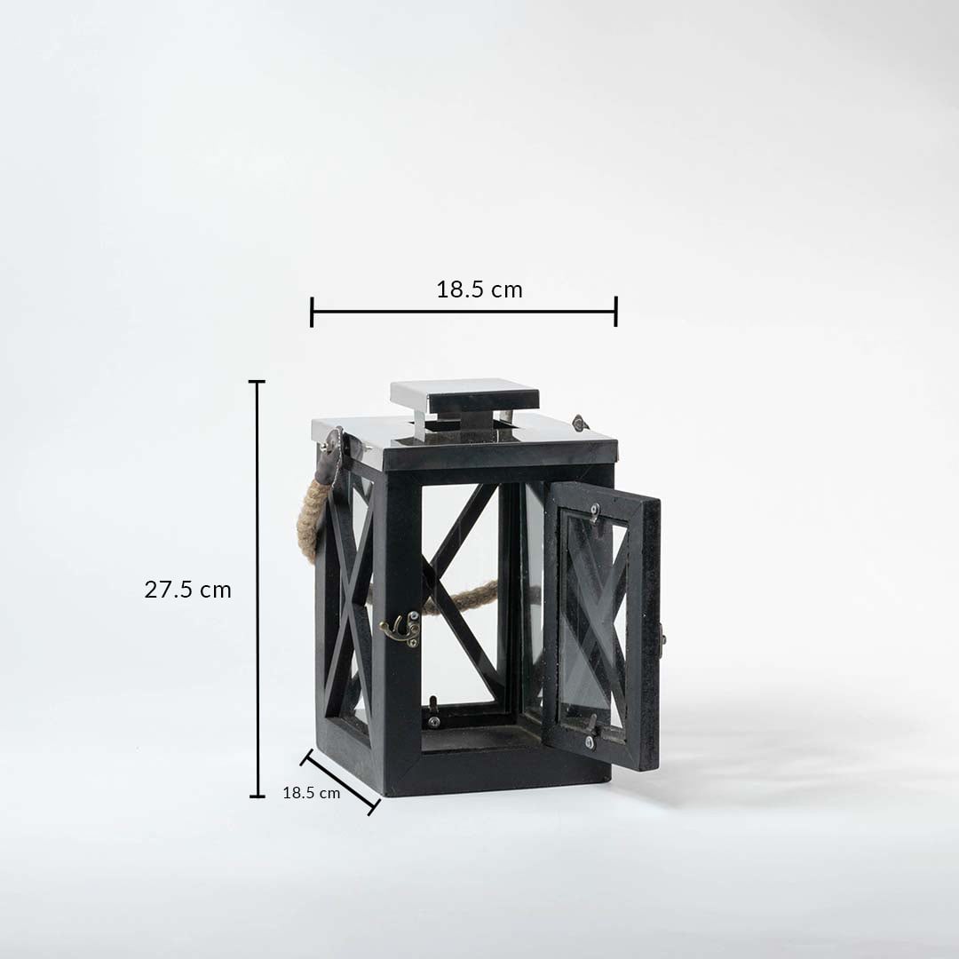 Dimensions of the Black Lantern are 27.5 cm in height and 18.5 cm in width ideal for tabletops patios and entryway décor.