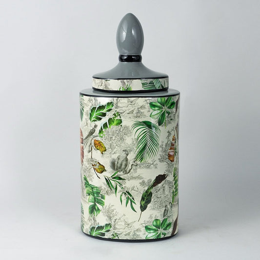 Tropical leaf jar with elegant botanical design shown clearly on a plain white background.