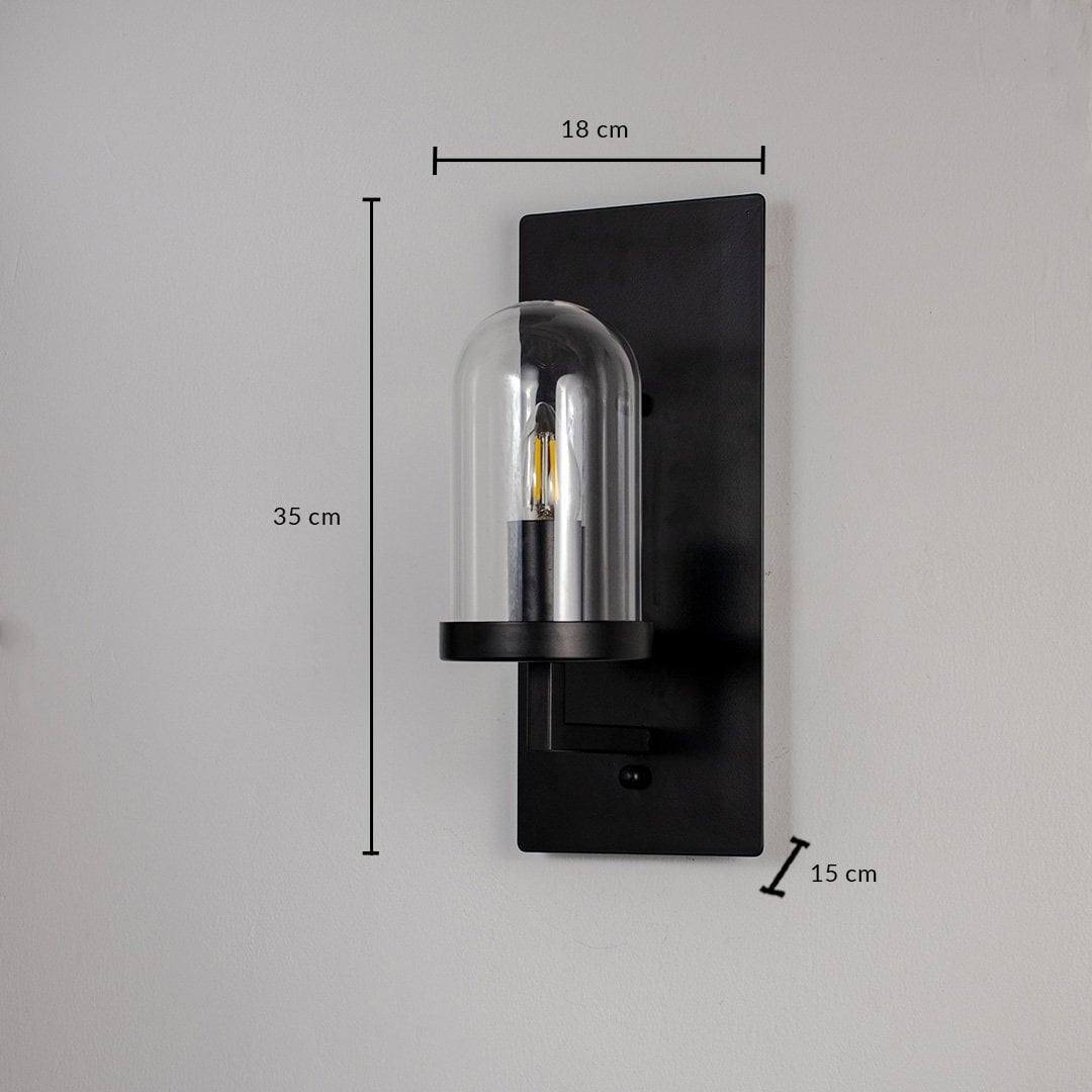 Black metal and glass wall light showing 22 cm height 8 cm width and 10 cm projection suitable for hallway or bedside wall mounting.