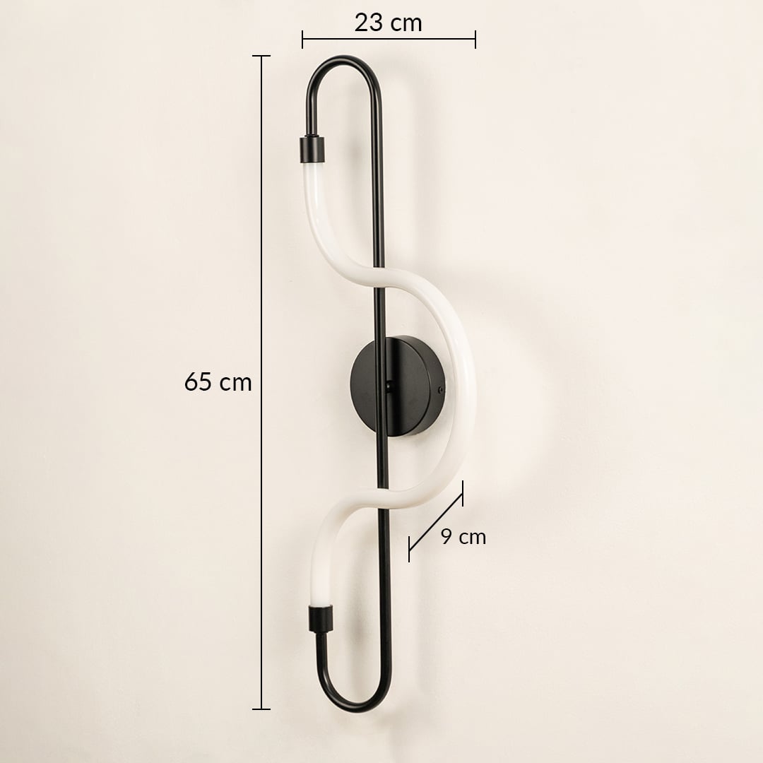 A black LED wall light shown on a white background with clear dimensions of 65 cm height 23 cm width and 9 cm depth for accurate fitting.