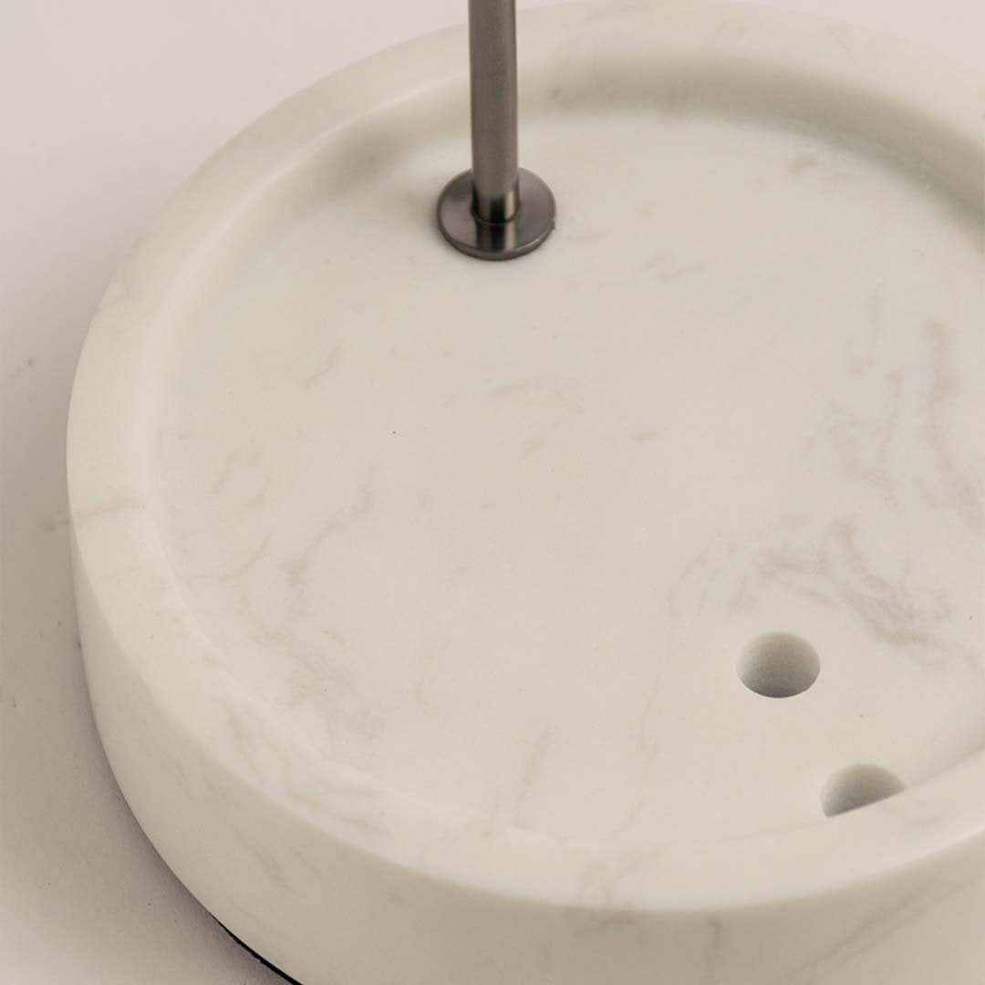 Detailed closeup of the upper metal ring of the vase displaying smooth finish and polished craftsmanship.