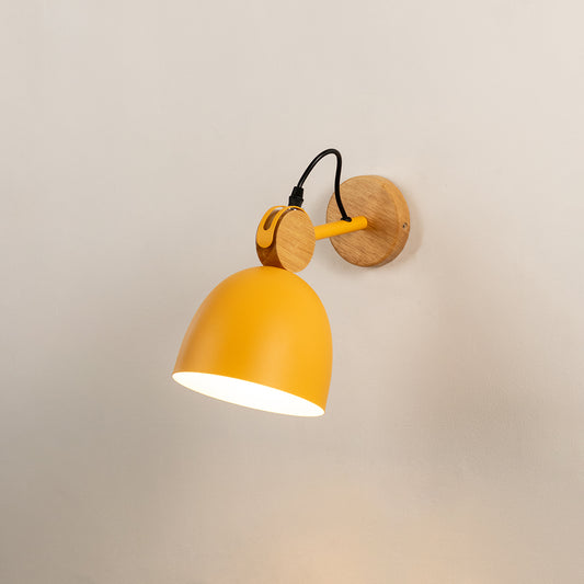 Stylish wall light with yellow metal shade and wooden base perfect for bedroom bedside or study wall decor placement on clean background.