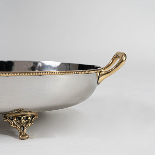 Elegant silver serving tray with gold accents shown partially packed in black luxury gift box with lid open.