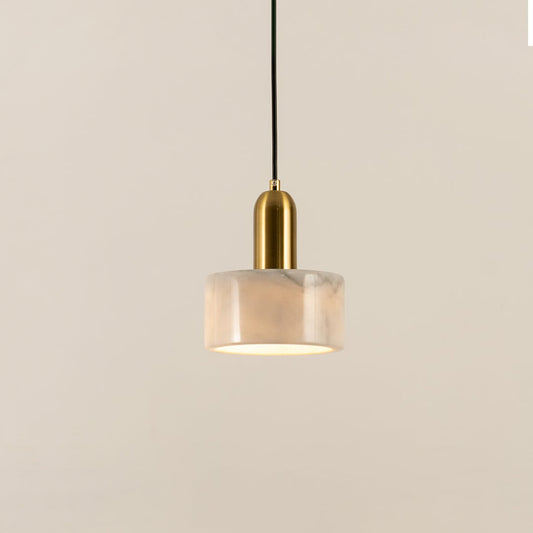 White marble pendant light with polished gold fittings crafted for stylish contemporary interiors.