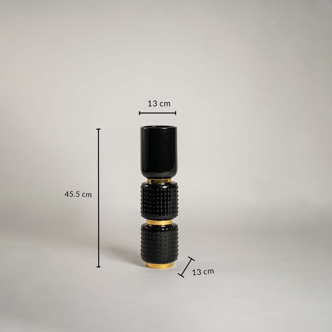 Dimension image of a tall black textured ceramic totem vase featuring stacked geometric sections and gold accents 45.5 cm height and 13 cm width.