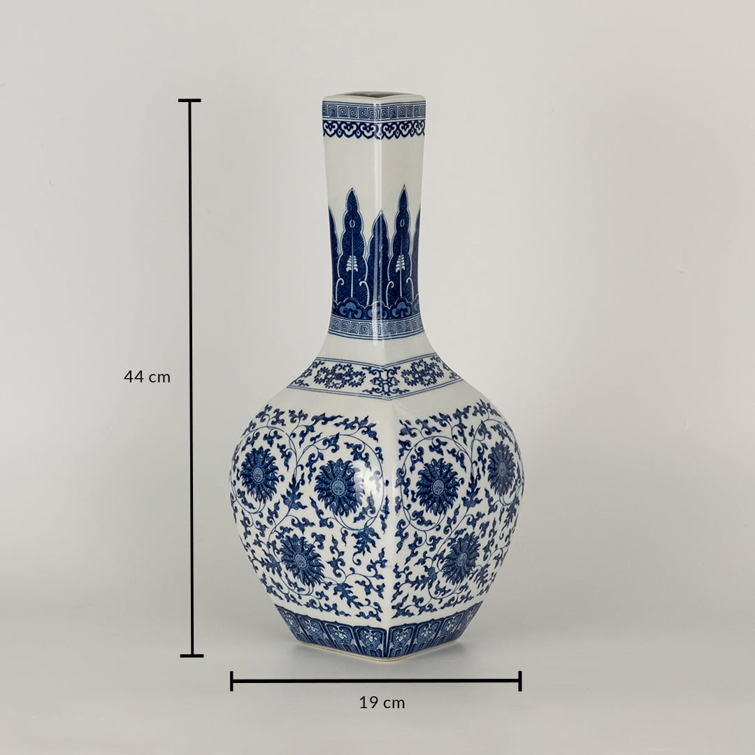 Blue and white ceramic jar with tall narrow neck and floral artwork displayed with dimensions of 44 cm height and 19 cm width creating an elegant artistic presence.