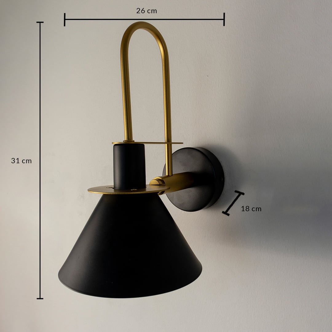 Black and gold wall light 31 cm tall and 26 cm wide shown for size detail perfect for bedroom or hallway lighting.