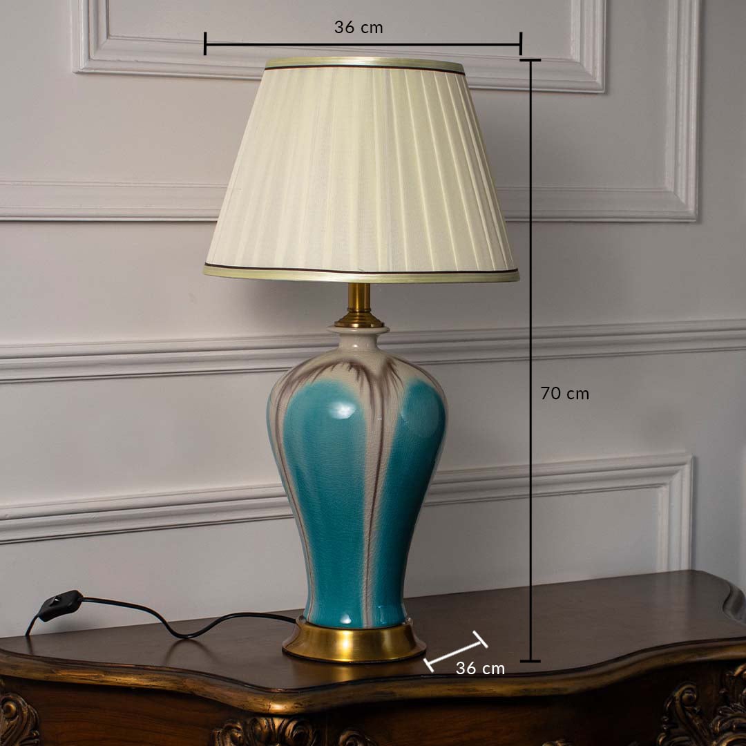 Ceramic table lamp with pleated shade and golden base showing height 70 cm and width 36 cm for detailed product reference.