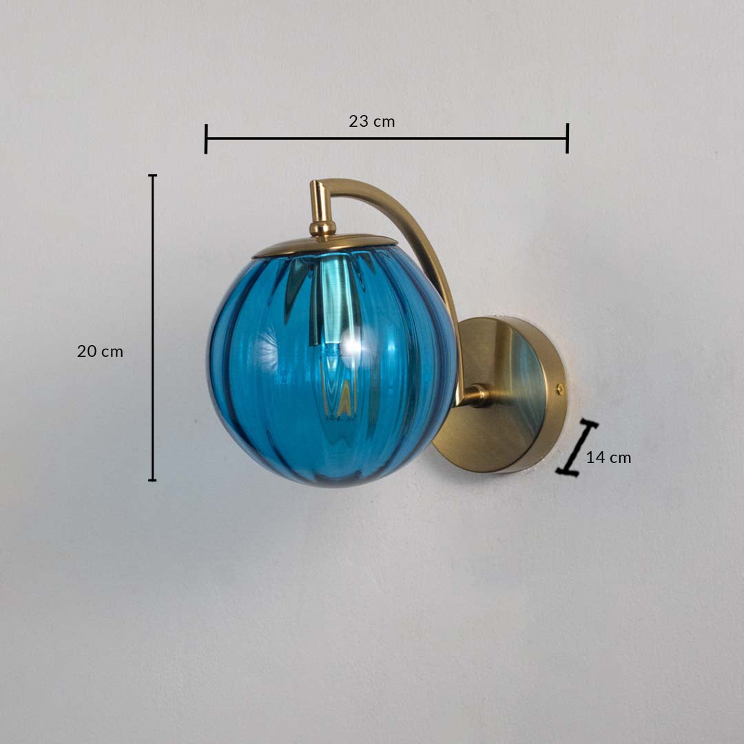 Modern brass wall light with blue glass globe measuring 26 cm height and 25 cm width for stylish interiors.