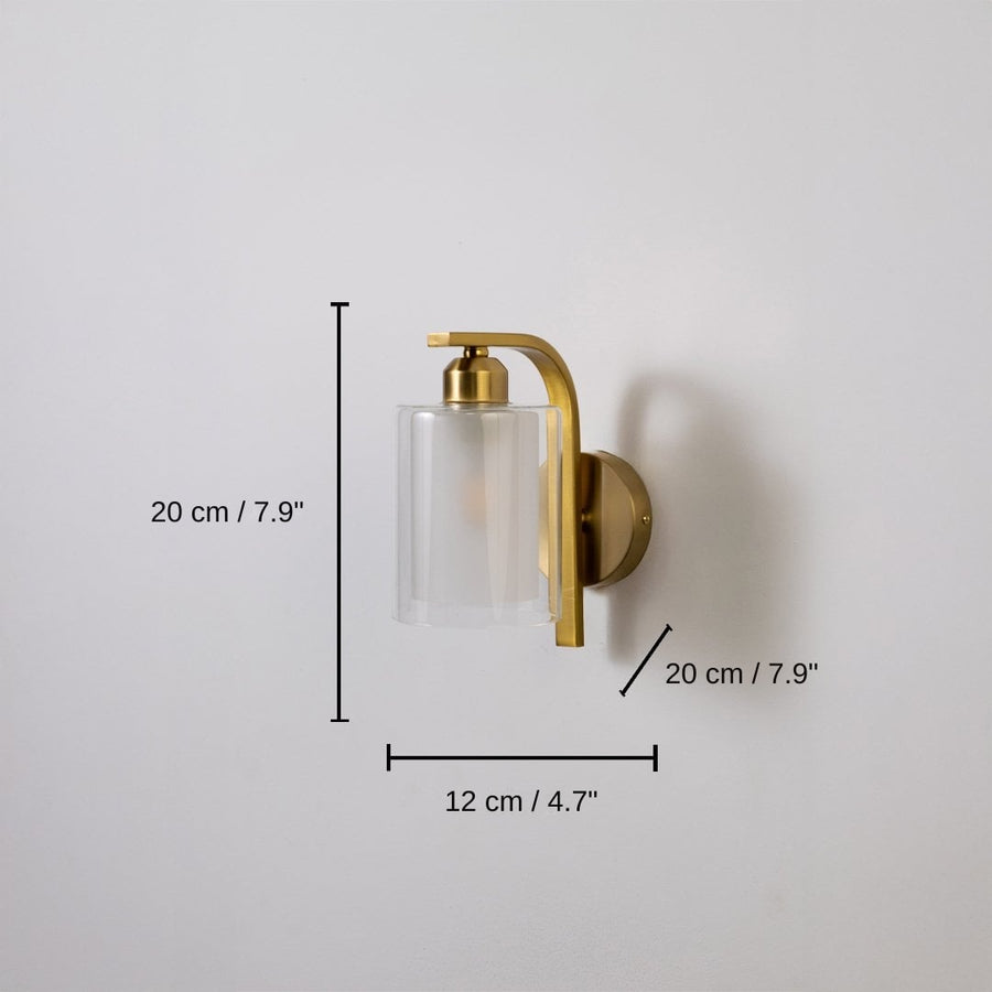 Gold metal wall light with clear glass shade, 20 x 12 x 20 cm (7.9 x 4.7 x 7.9 inches) dimensions