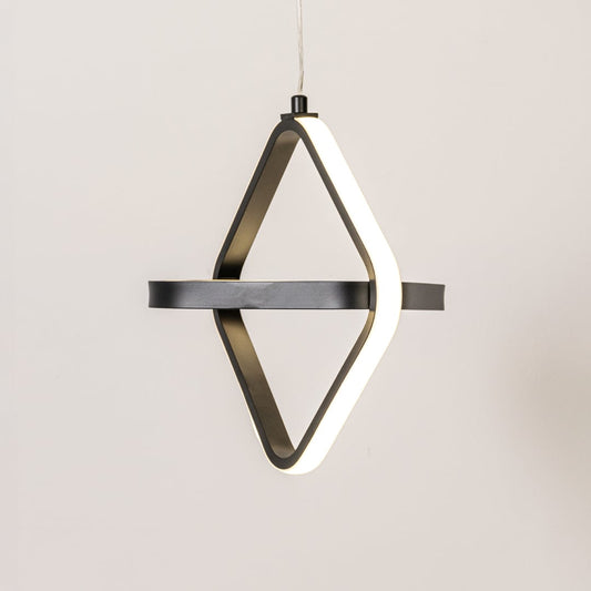 Black and white geometric LED pendant light glowing softly on white background for modern living room kitchen island decor.