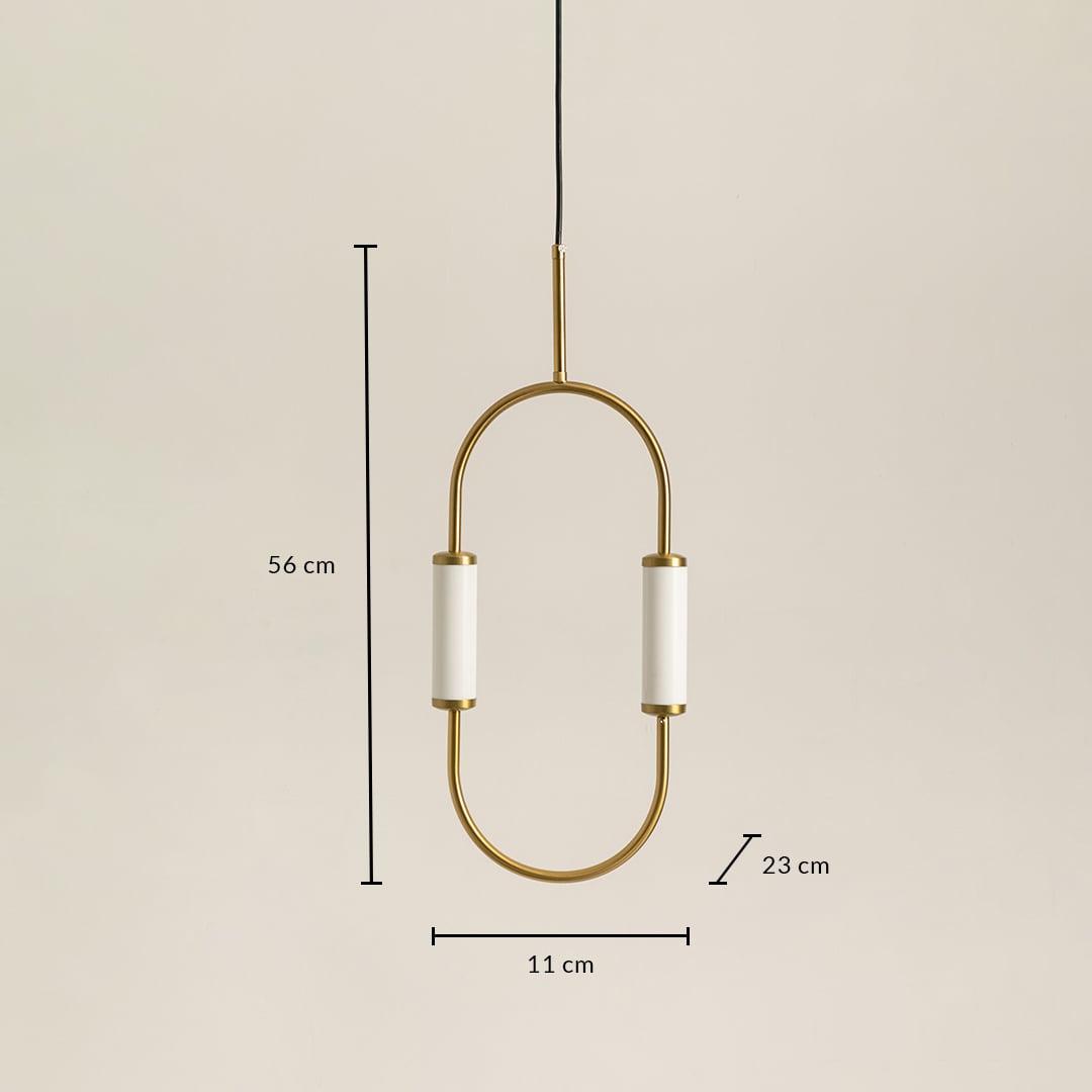 Modern oval brass pendant light with white cylinder shades measuring 56cm height 23cm width and 11cm depth dimensions.
