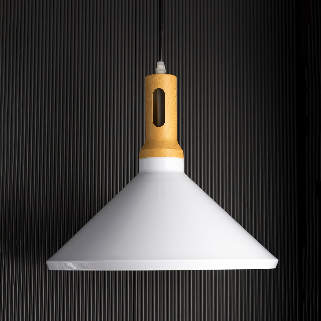 Modern pendant light with white metal cone shade and gold holder shown unlit on black background for contemporary interior ceiling decor.